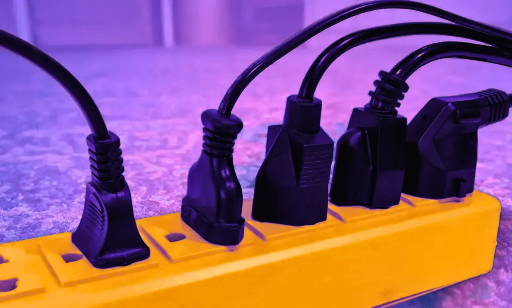 Cords plugged into a power strip