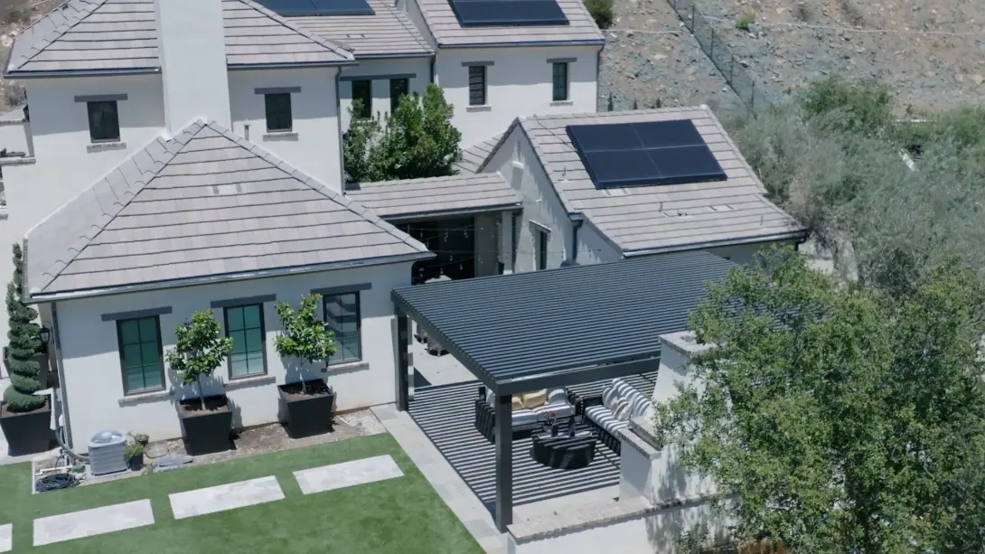 Aerial image of solar panels on the back of a house