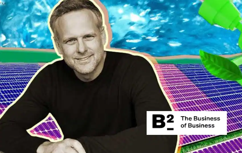 GoodLeap CEO Hayes Barnard featured by The Business of Business, with solar panels in the background.